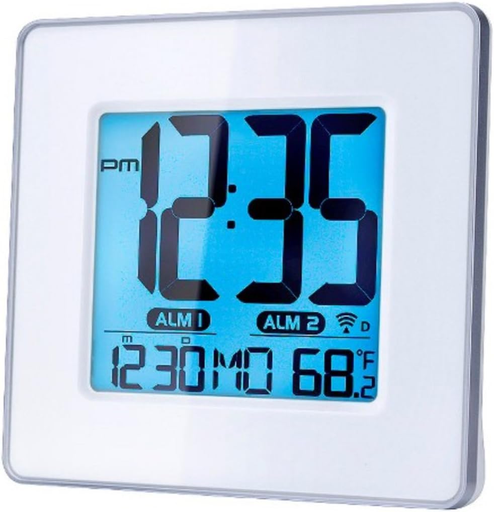 Front view of the Capello Self-Setting Atomic Clock showing the digital display with time, date, and temperature.