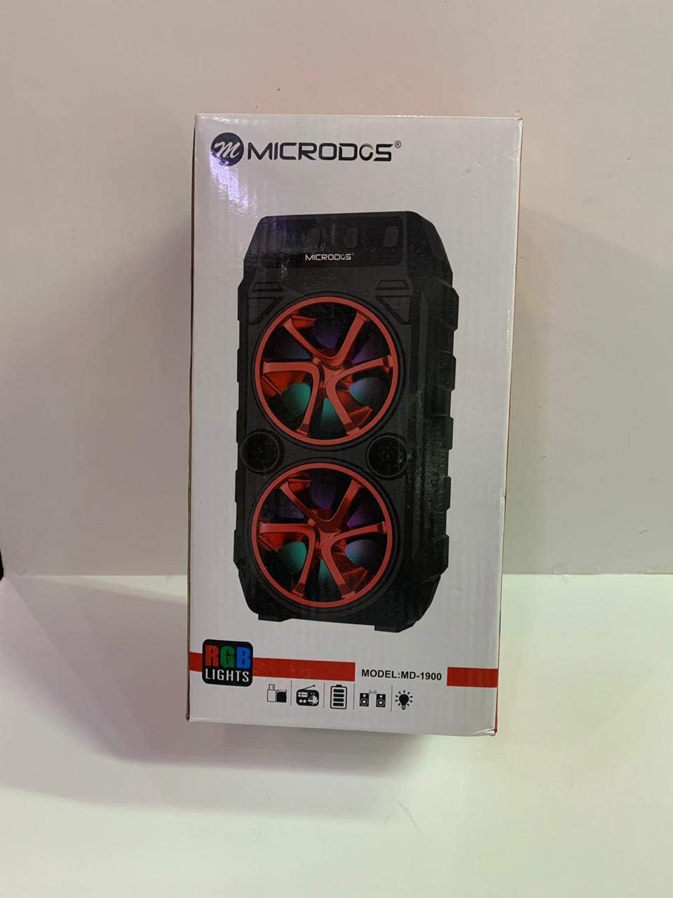 Microdos MD-1900 Bluetooth Speaker showing front panel with RGB lights and controls