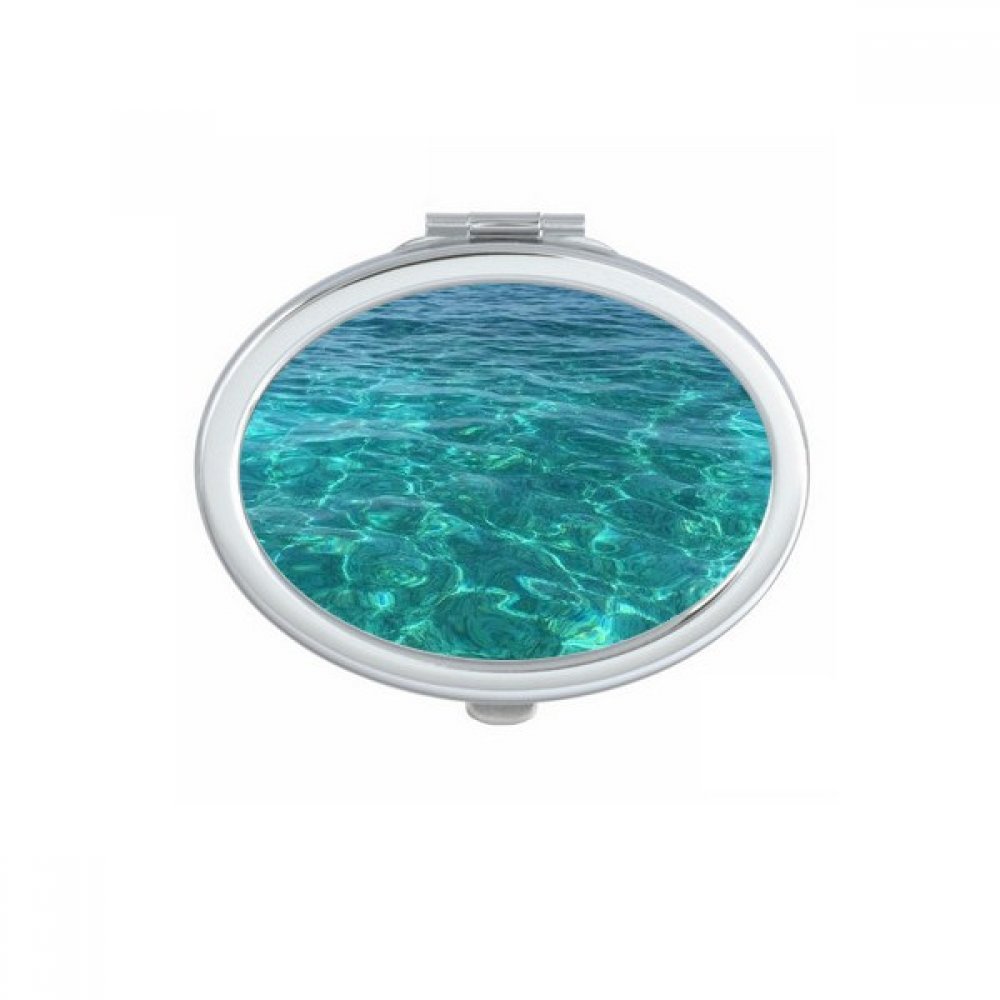 Miroir de maquillage compact portable motif nature pour vos retouches en voyage