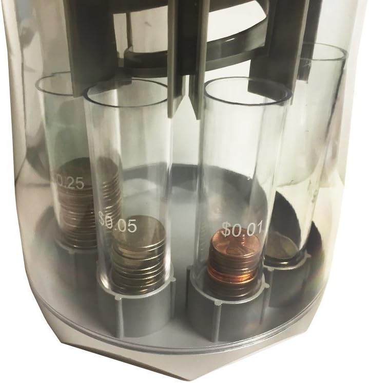 Close-up of the coin sorter's clear tubes, showing sorted quarters, nickels, dimes, and pennies