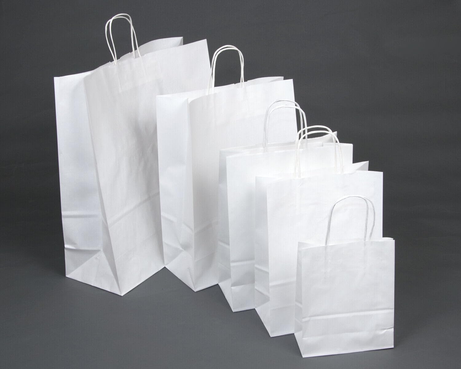 Carrier Bags - Twist Handle White Paper - 12.5" x 5.5" x 16.5" / 32cm x 14cm x 42cm - Pack of 20