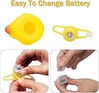 Vista 3 de wonuu Adornos de pato de goma para automóvil, decoración de tablero de instrumentos de pato amarillo, cuernos de bicicleta de pato con casco