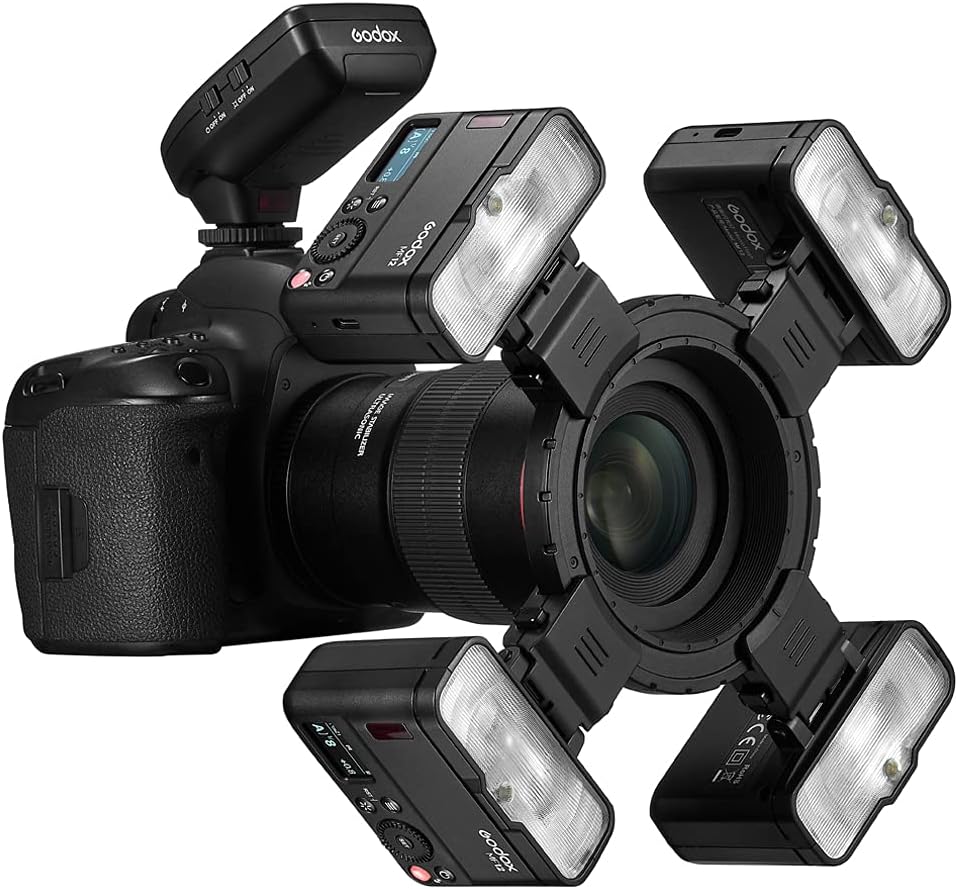 Multiple Godox MF12 flashes on a camera lens ring
