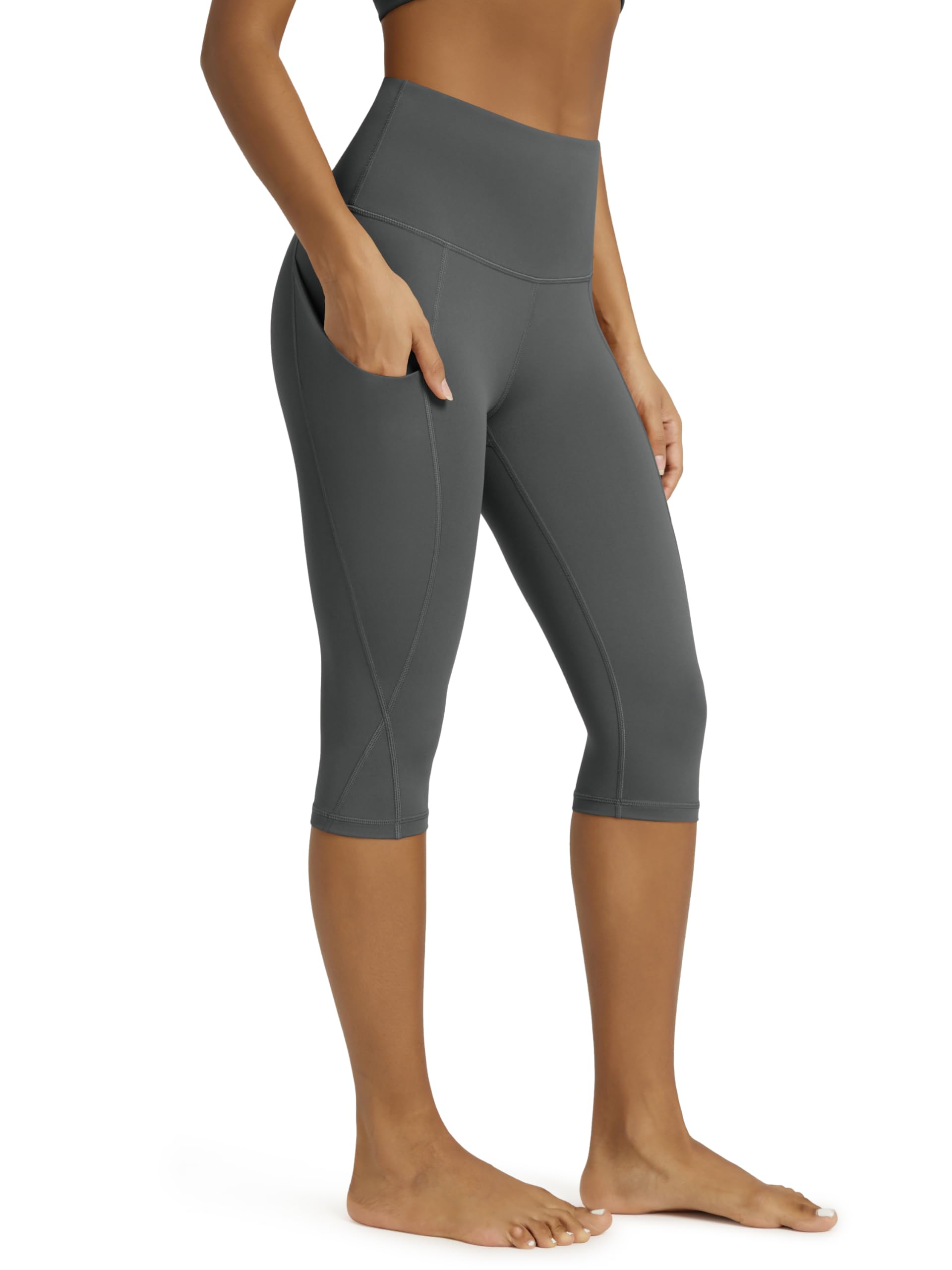ODODOS Women's High Waisted Yoga Capris with Pockets, Tummy Control Non See Through Workout Athletic Running Capri Leggings