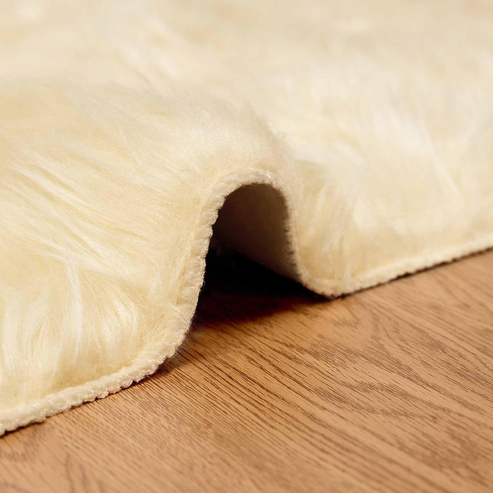 TAFALLA Tapis en peau de mouton synthétique rond Ø 200 cm – Imitation peau d'agneau moelleux à poils longs crème – Tapis de salon doux pour un intérieur confortable – Tapis en fausse fourrure