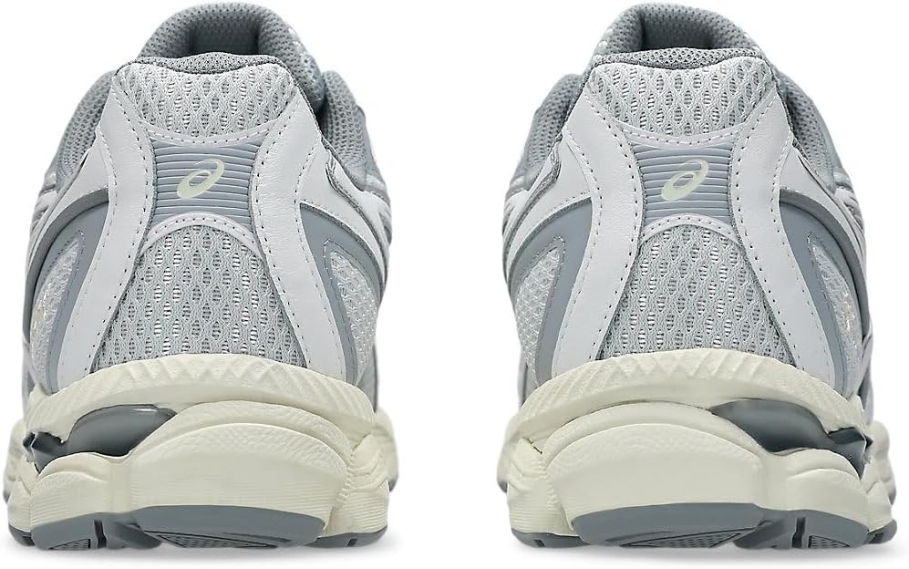 Rear-side view of a pair of ASICS Men's Gymnastics Shoes, highlighting the heel and ASICS branding.