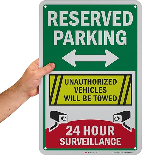 Miniatura 2 de SmartSign Letrero metálico de 18 x 12 pulgadas con texto en inglés "Reserved Parking  Unauthorized Vehicles Will Be Towed, 24 Hour Surveillance ",