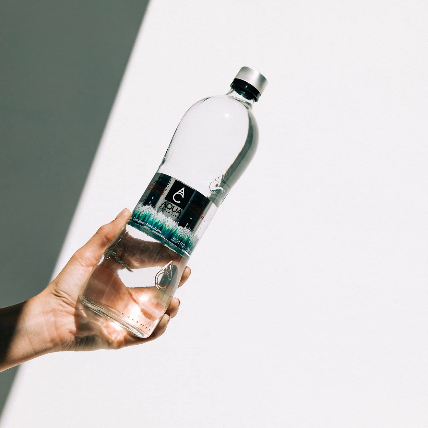 AQUA Carpatica Natural Sparkling Mineral Spring Water with Electrolytes, Naturally Carbonated in Glass Bottles, 750 ml / 25.36 oz. (12 Pack)