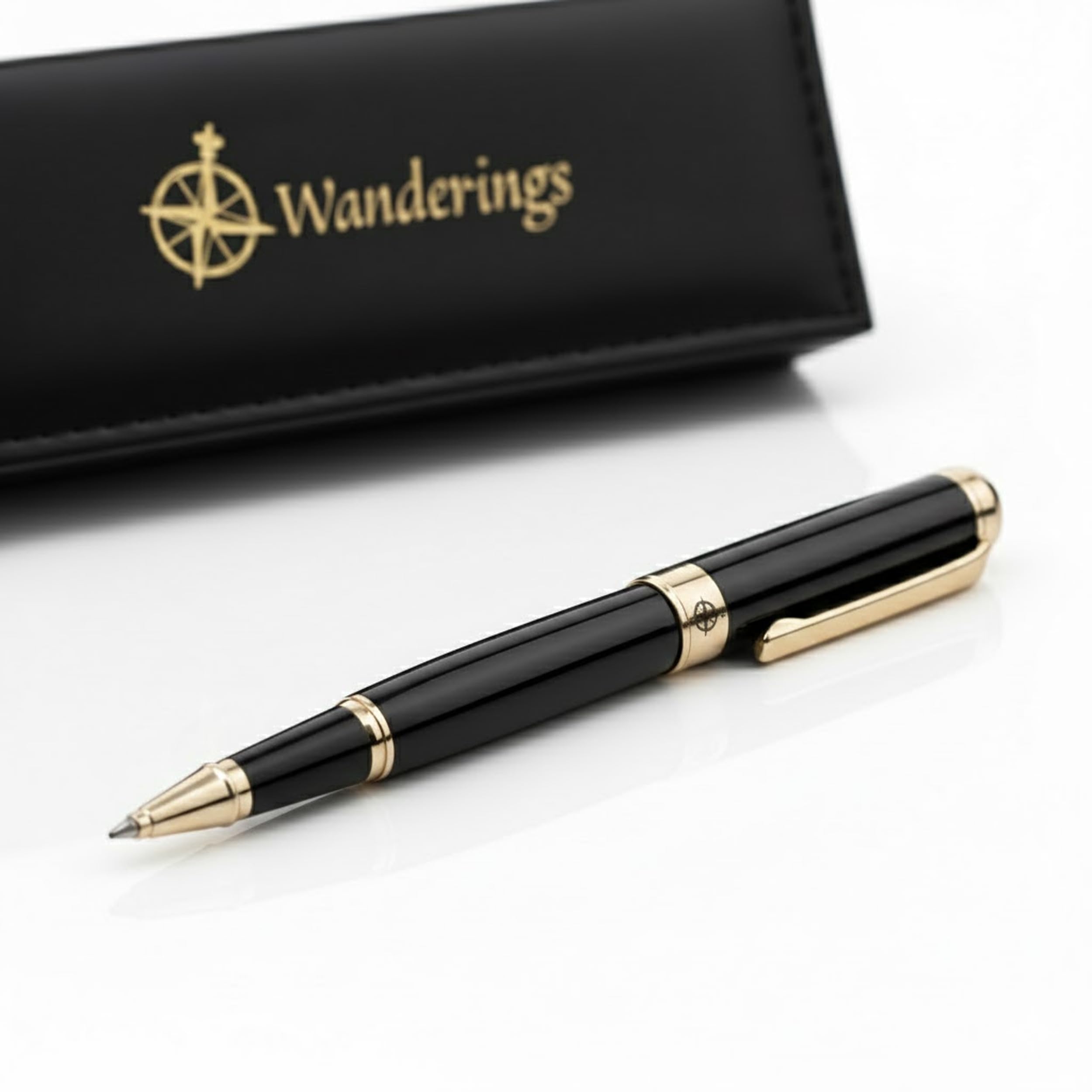 WANDERINGS Bolígrafo Rollerball Premium con Tinta Alemana – Escritura Sobresaliente, 24K Chapado en Oro – Negro Piano – Incluye un Recambio Schmidt en un Estuche de Presentación para Regalo