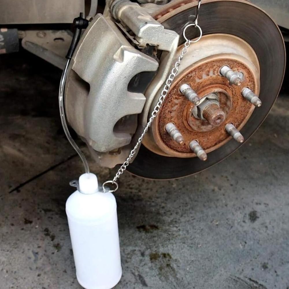 1 l zbiornik płynu hamulcowego z wężem 60 cm i gumowym adapterem, urządzenie do odpowietrzania hamulców, wymiana oleju hamulcowego, odpowietrzacz hamulców