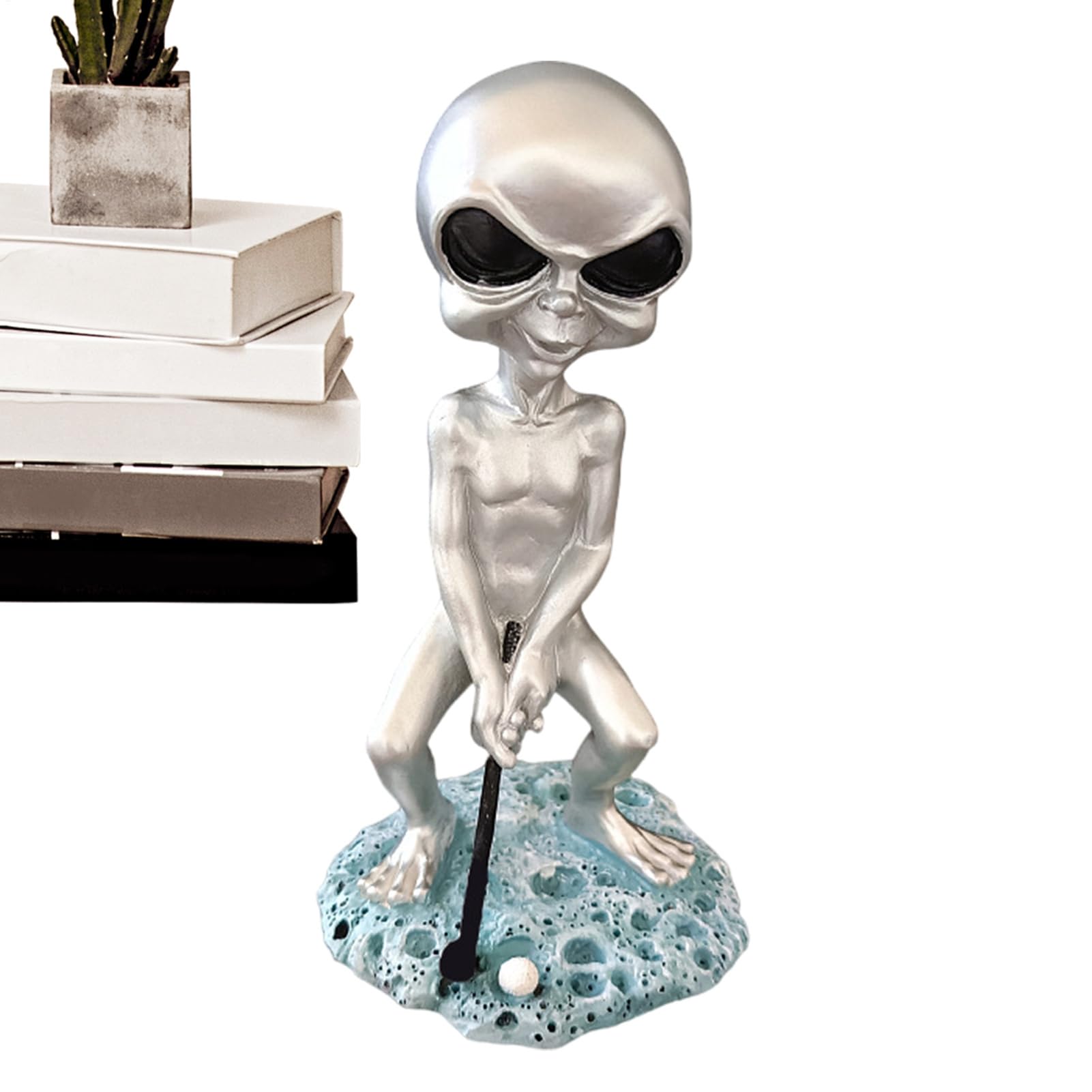 Figurine extraterrestre pour rompre la monotonie d'un jardin classique