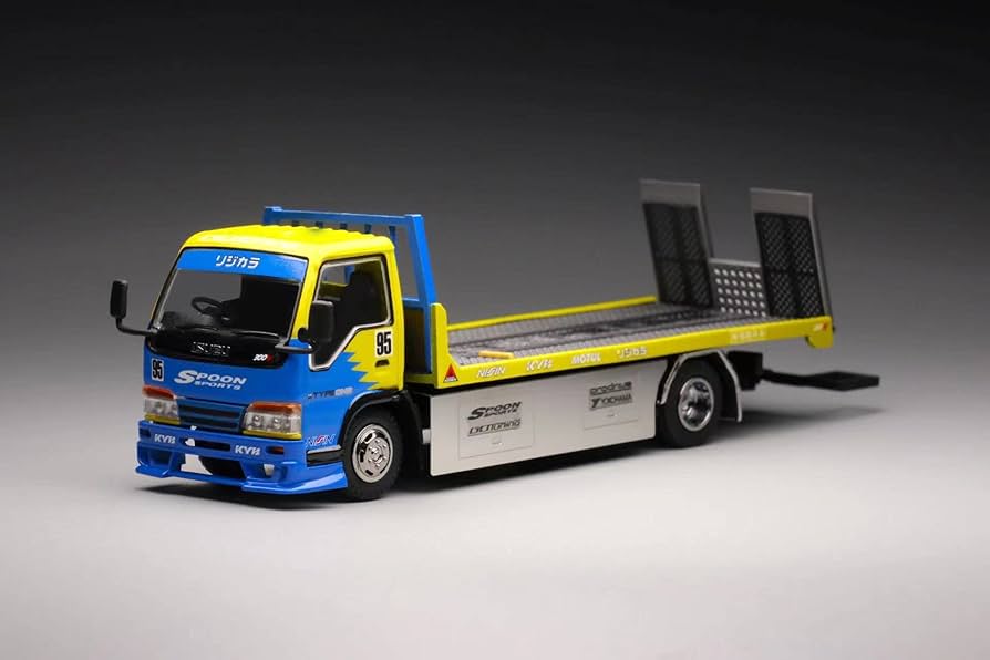 いすゞエルフ レッカー車　1/64 イエロー Amazon | いすゞ エルフ レッカー車 ホワイト イエロー 2台