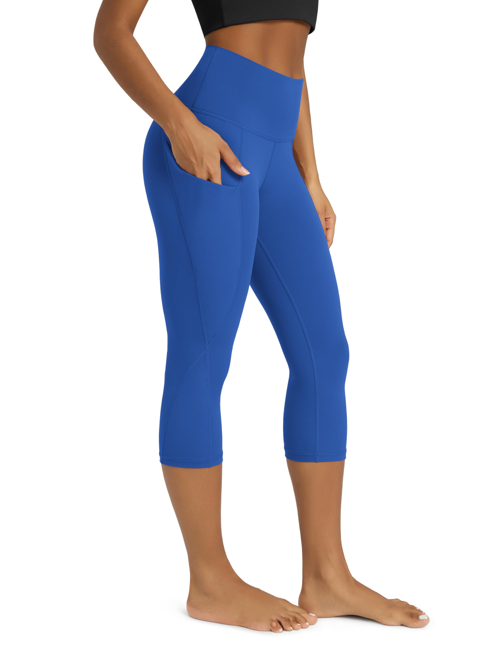 ODODOS Women's High Waisted Yoga Capris with Pockets, Tummy Control Non See Through Workout Athletic Running Capri Leggings