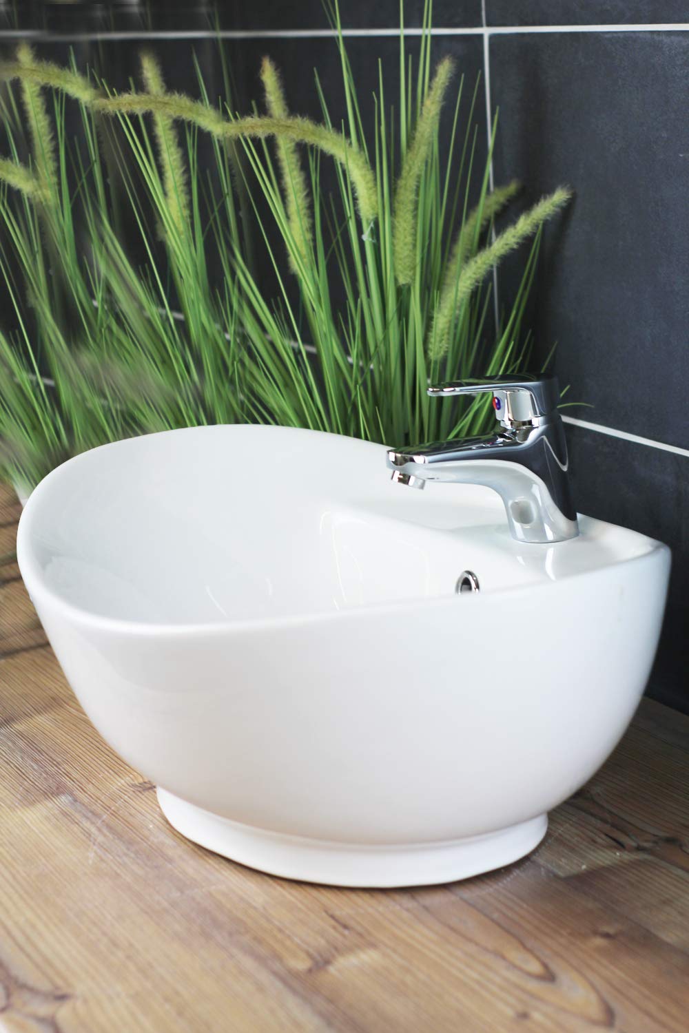 Lavabo sobre encimera ovalado 60 x 40 cm Ceramica Blanca diseño moderno