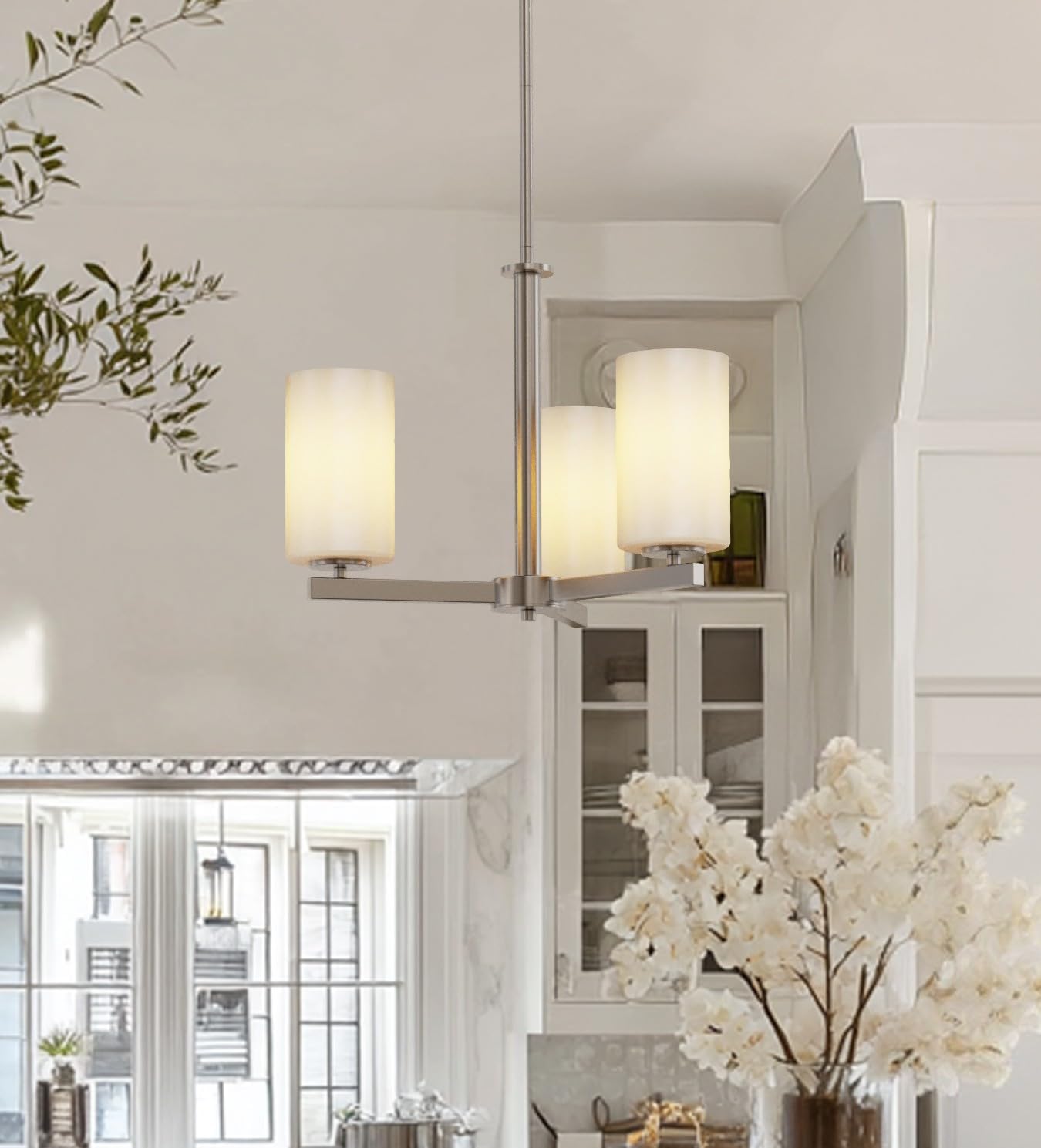 Tawson 3-Light Chandelier installed in a modern kitchen with white cabinets and an island