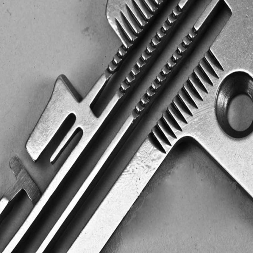 Close-up of the E809 Needle Plate's feed dog slots