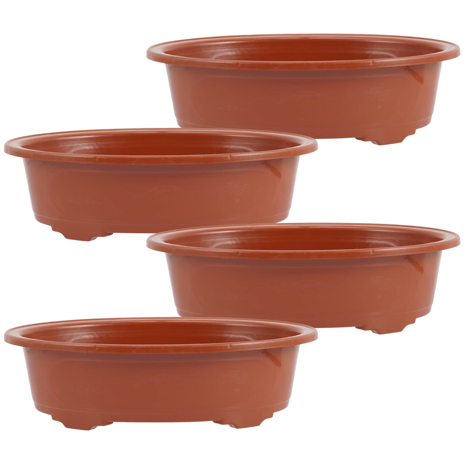Pots de fleurs ovales marron pour bonsaï sur balcon