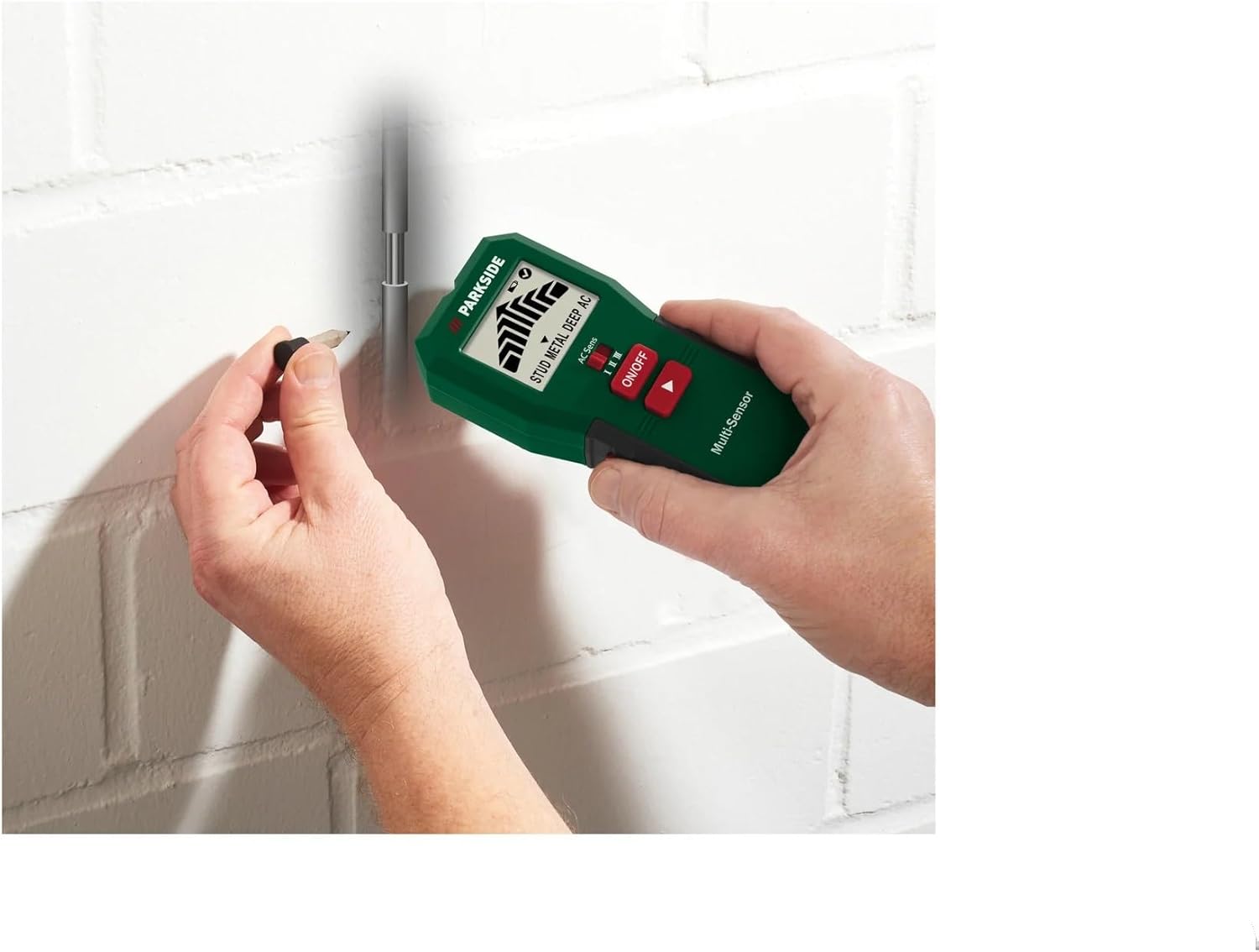 Parkside PMSHM2 A3 detector marking a detected point on a wall