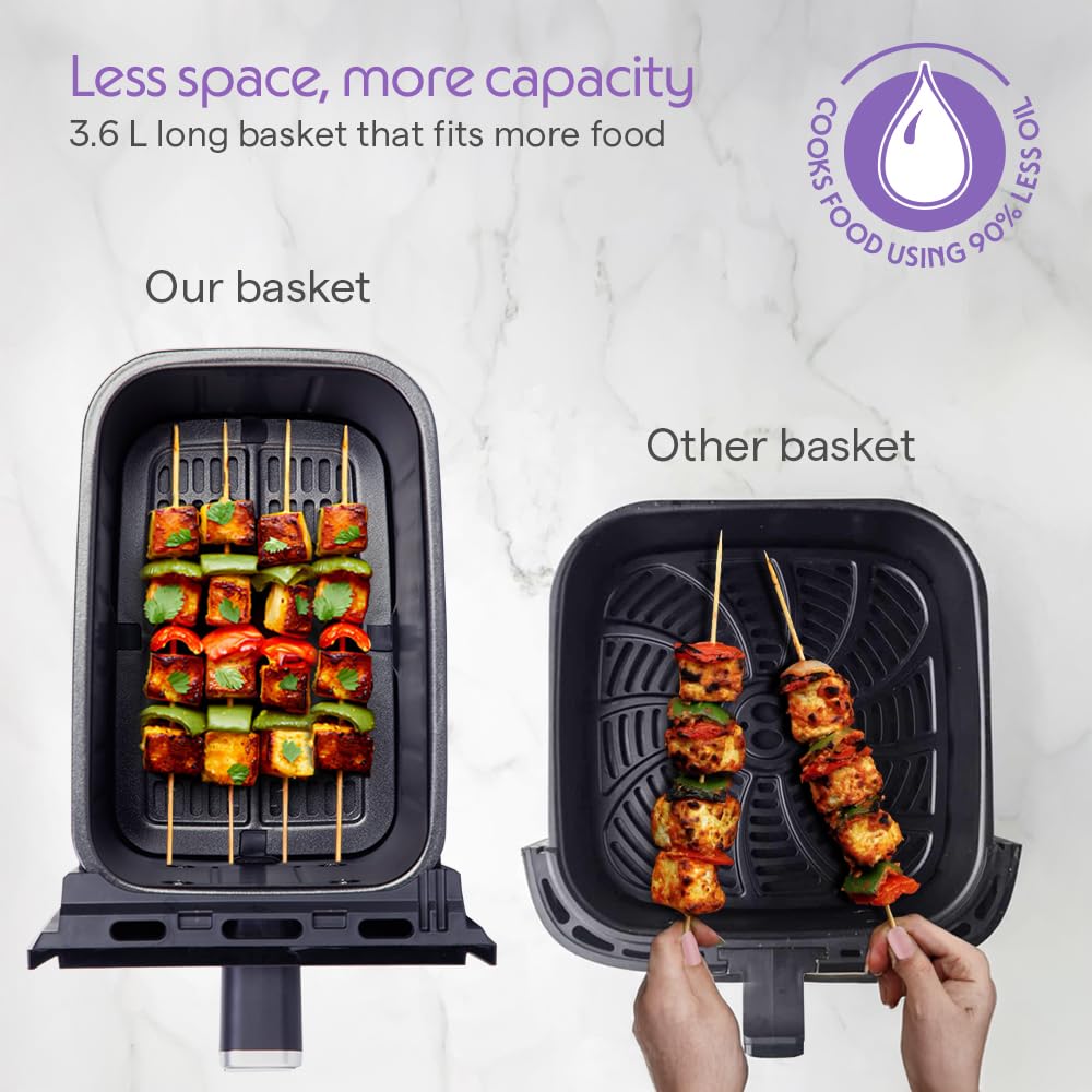 The photo shows the difference between a borosil's long air fryer basket, which holds more food, and other brand's shorter basket.