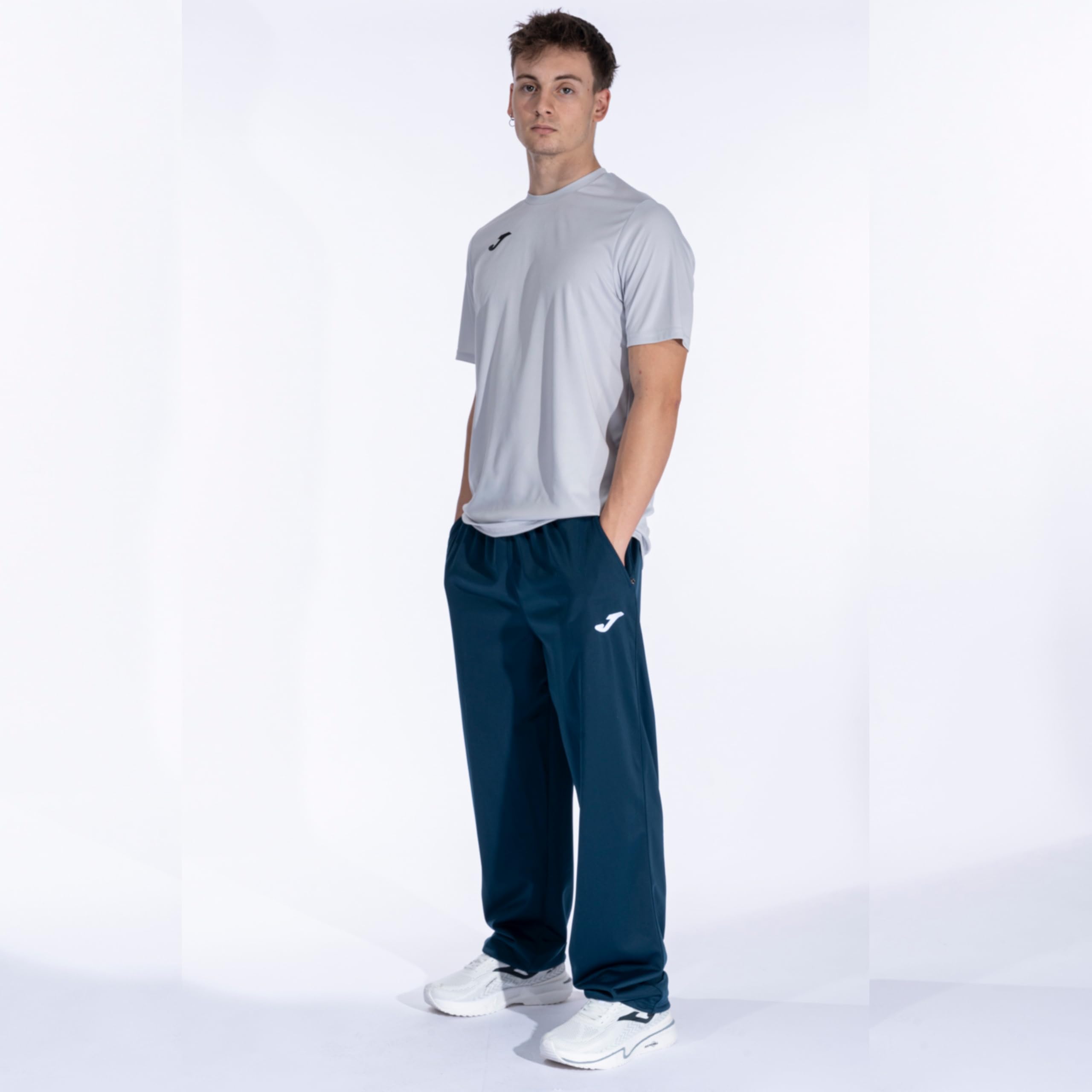 Joma - Pantalón Largo Deportivo Hombre , S - 3XL - Bolsillos con Cremallera y Cintura Elástica con Cordón - Cannes II