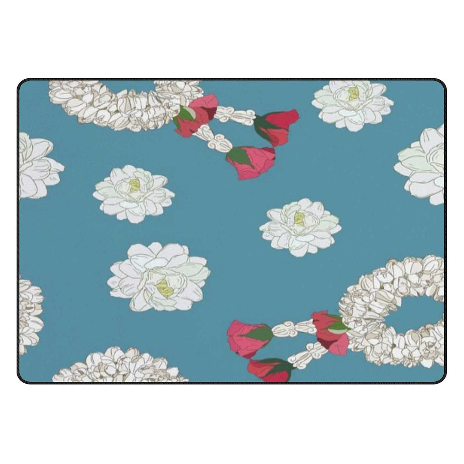 Tapis blanc floral en velours corail pour créer un cocon doux dans la chambre