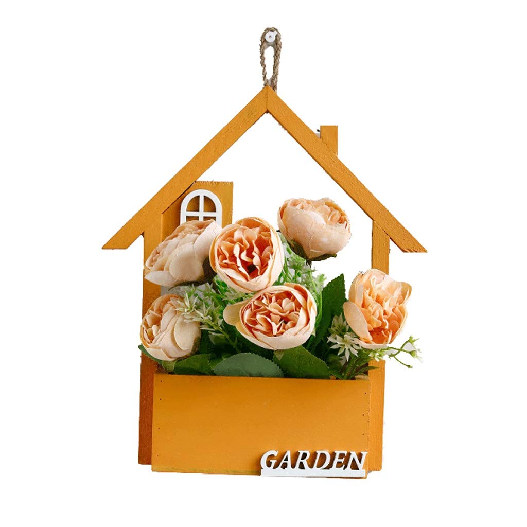Pots de fleurs orange pour créer un jardin suspendu sur le mur du balcon
