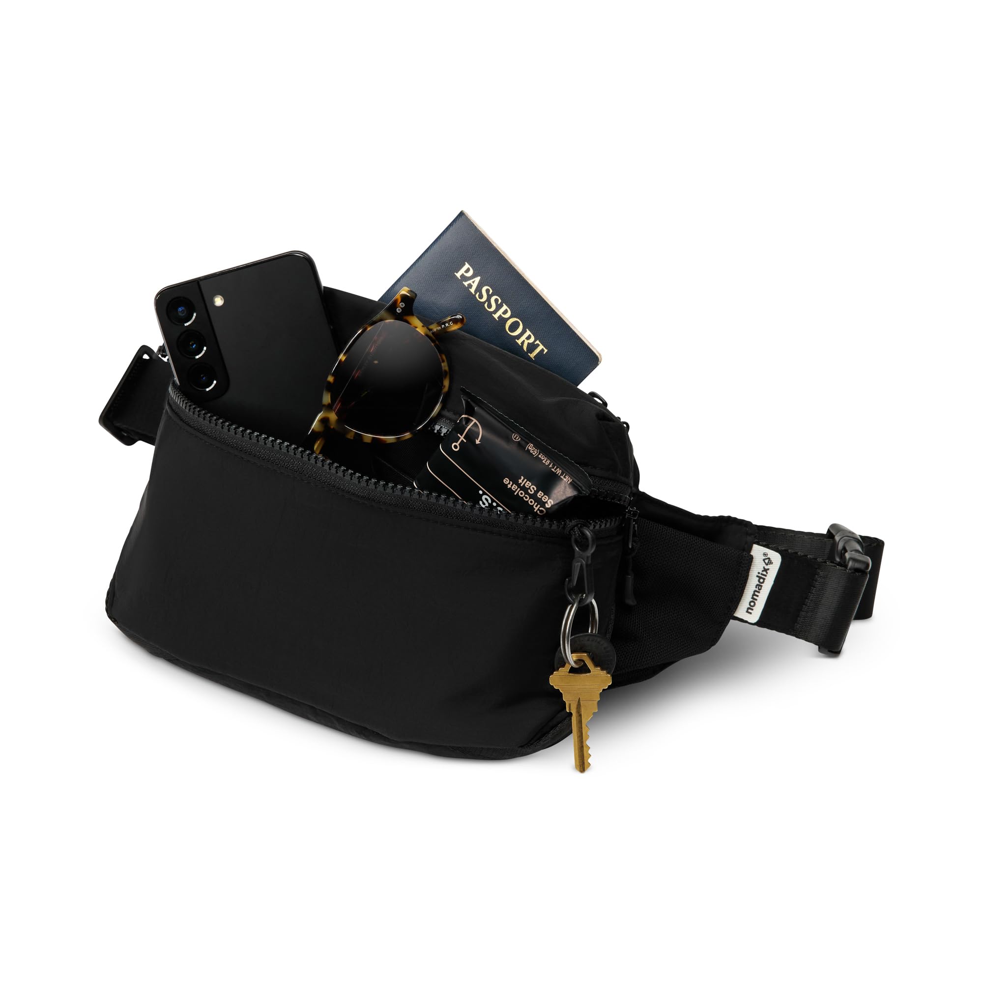 Nomadix Fanny Pack Raven Black - Bolsa cruzada ligera y resistente al agua para senderismo, festivales y viajes, nailon reciclado ecológico con clip para llaves, bolsillos dobles y almacenamiento