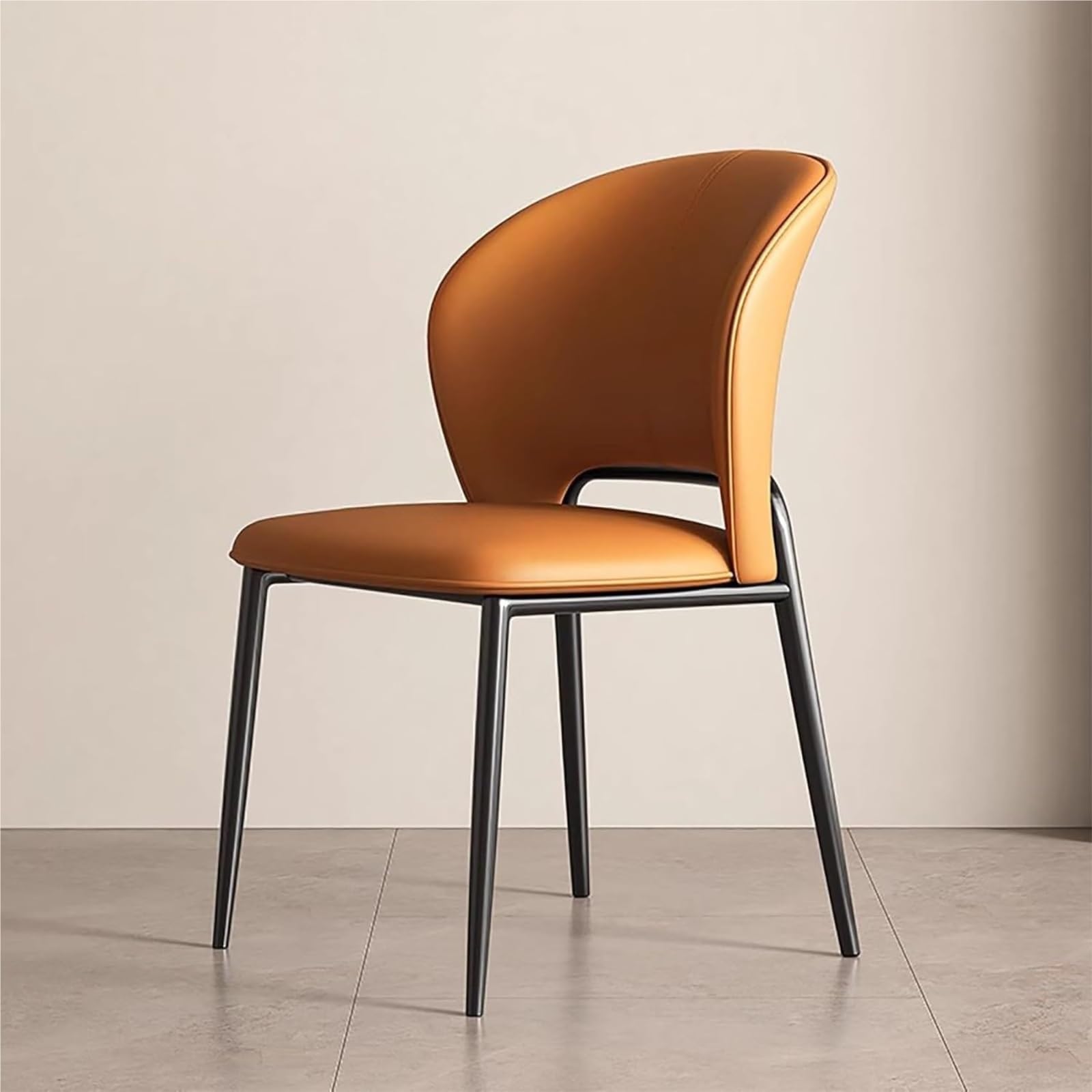 Chaise salle à manger cuir orange design au dossier courbé et pieds métal
