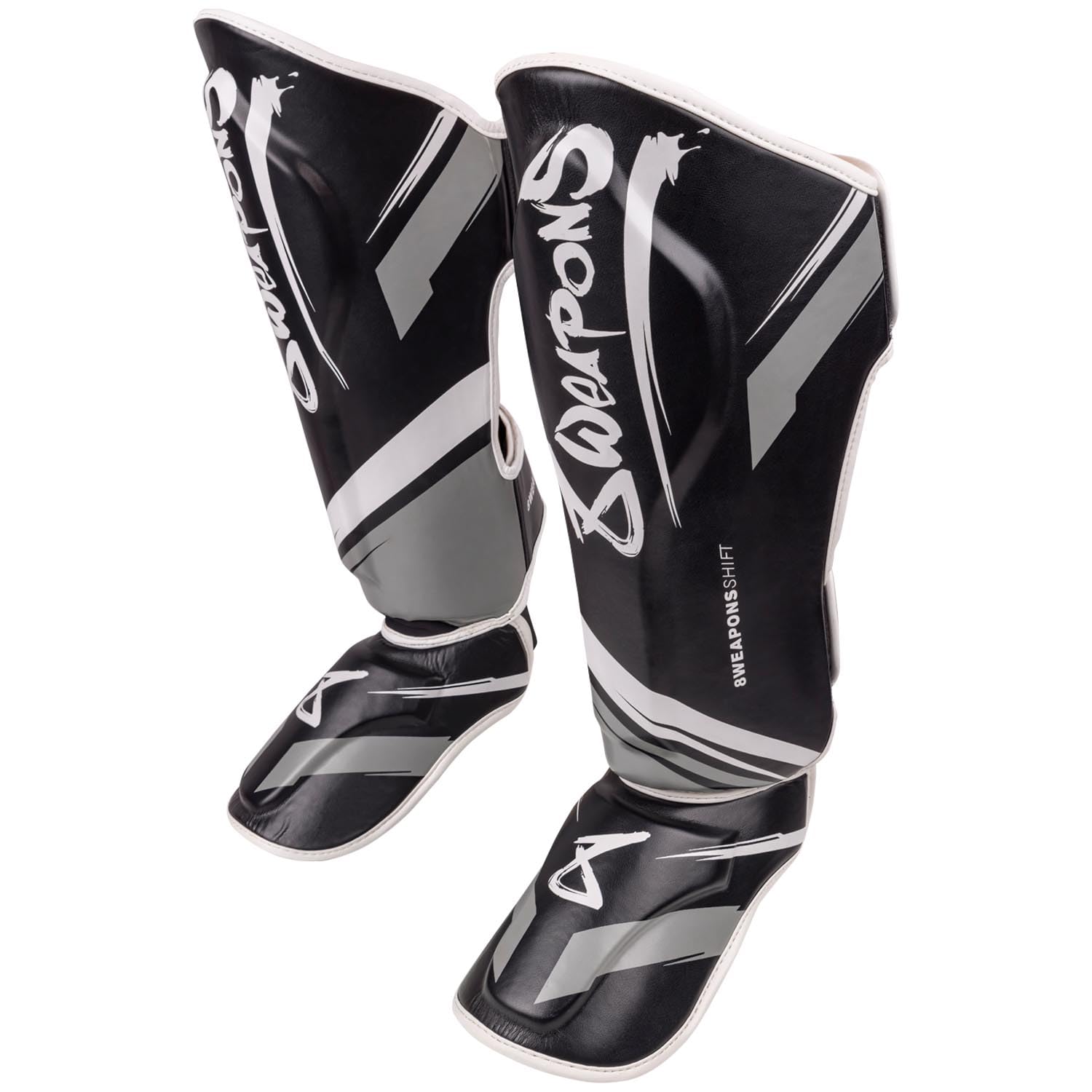 8 WEAPONS Espinilleras Shift, color blanco y negro, entrenamiento y competición, piel sintética de alta calidad y amortiguación perfecta, Muay Thai, K1, MMA, karate y kickboxing