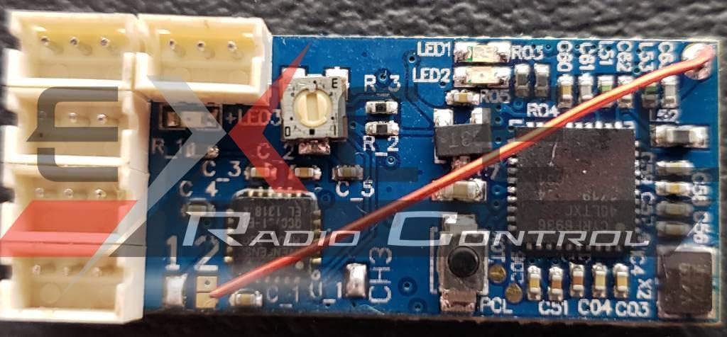 Close-up of DasMikro DSK-130 V1 receiver showing LED indicators and components