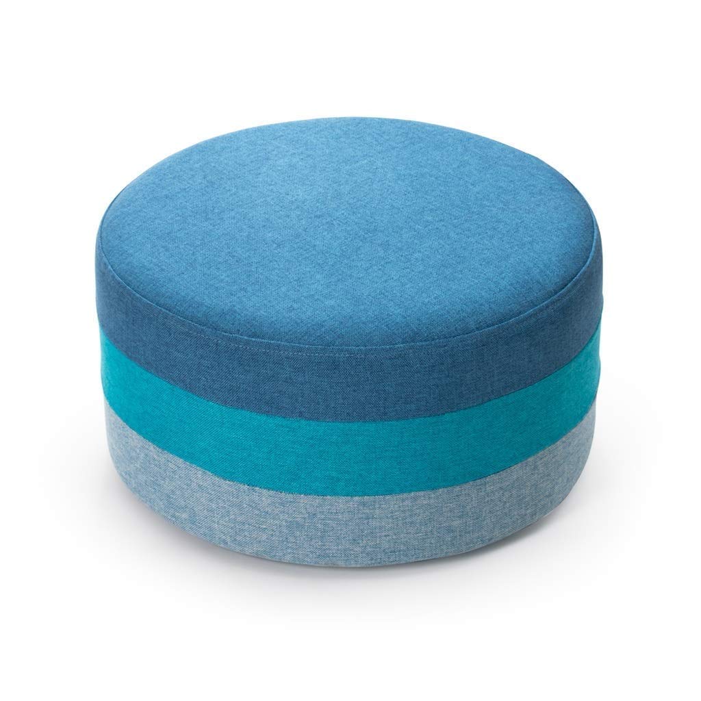Tabouret de pied rond bleu pour changer de chaussures confortablement dans l'entrée