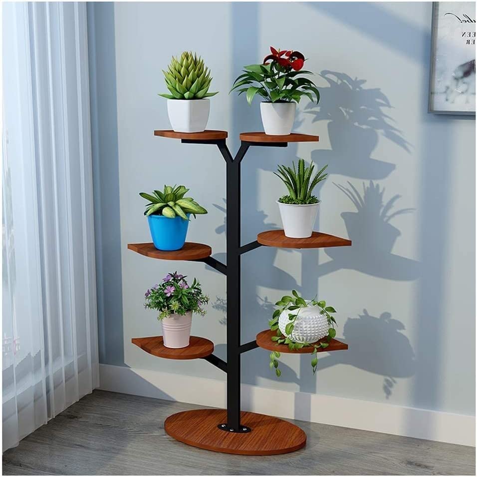 Support de plante en fer pour optimiser l'espace des petits salons