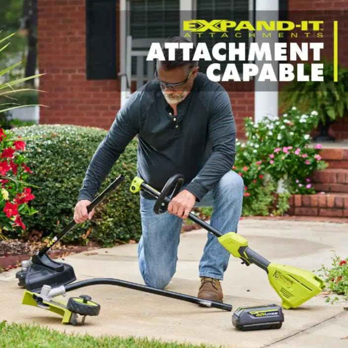 Person attaching a tool to the Expand-It powerhead