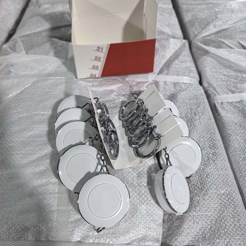 Multiple PROBON Retractable Mini Tape Measure Keychains in packaging