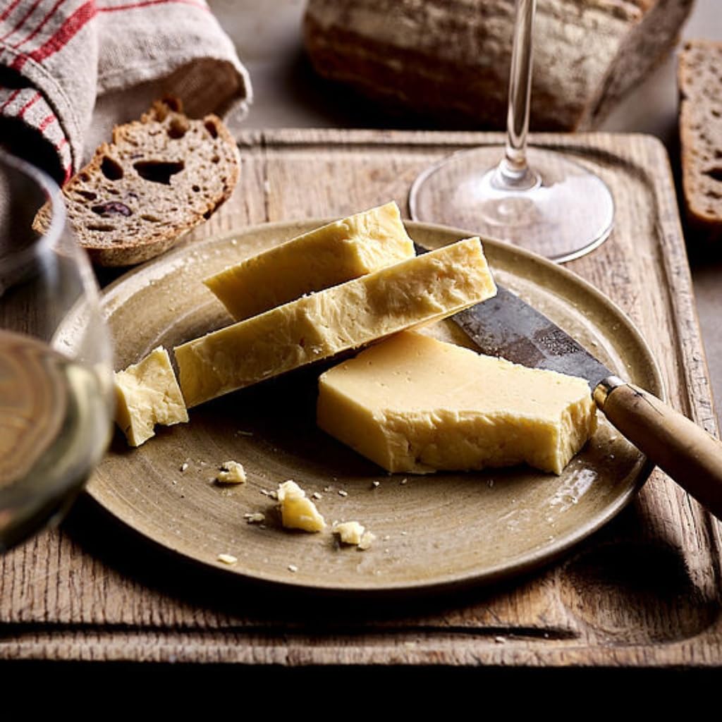 Fromage West Country Farmhouse Cheddar AOP 1kg Dorset Reserve affinage en cave 12 mois minimum - une reference depuis 1833 - Fromagerie du Château