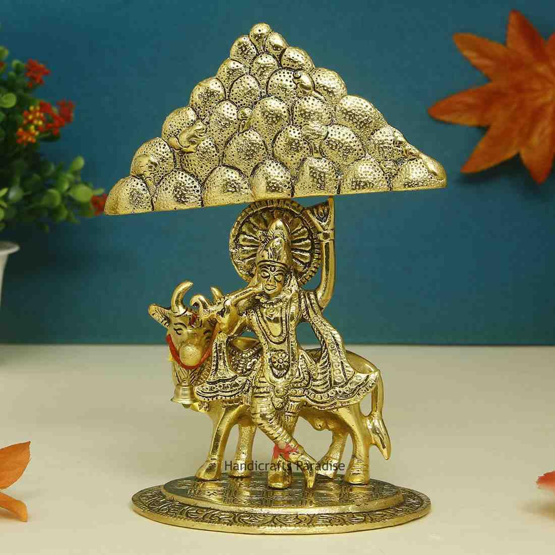 Handicrafts Paradise Krishna Lifting The Mountain in Metal Antique Gold Plated