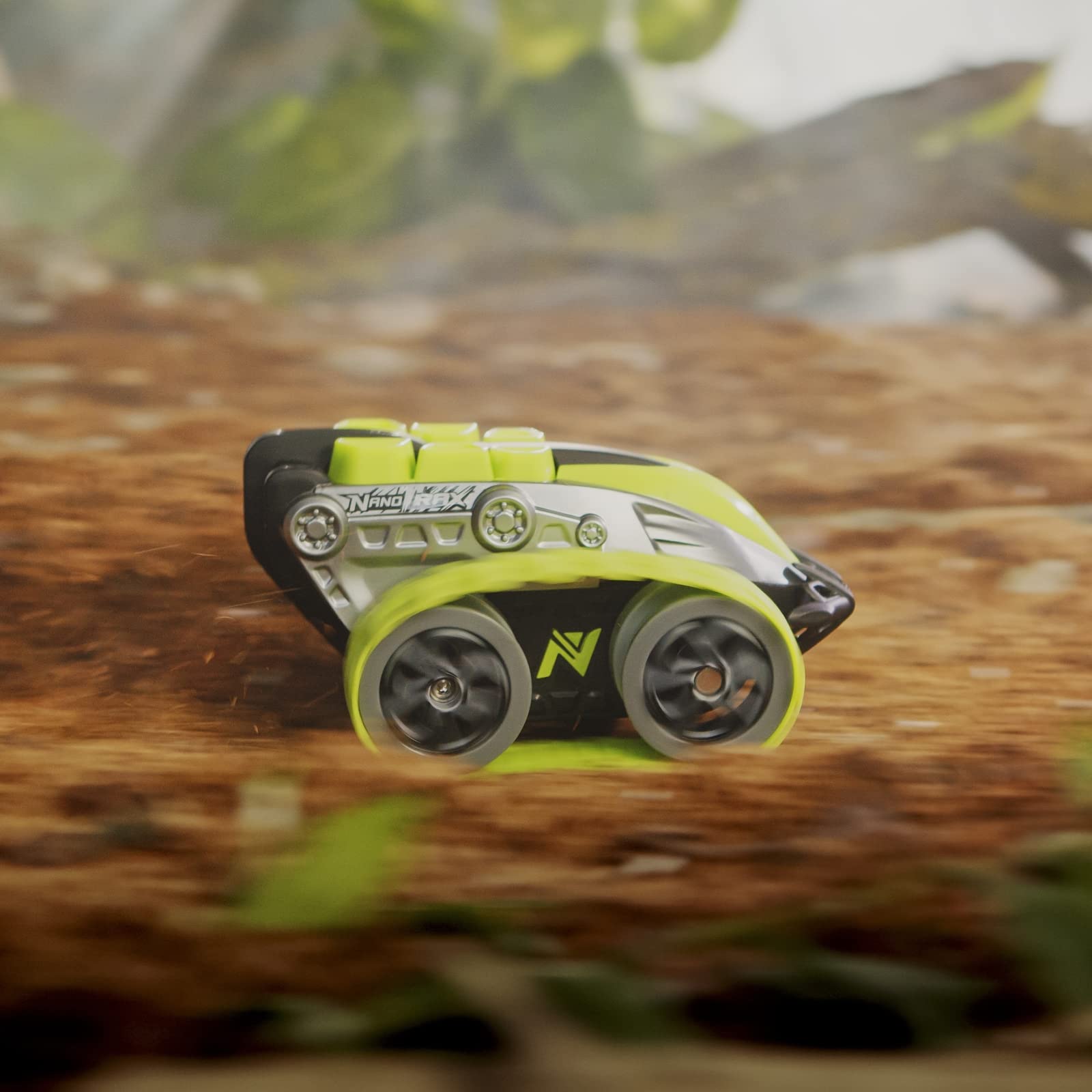 Nikko 10181 Nano Trax zdalnie sterowany samochód RC, mini pojazd gąsienicowy offroad, mały czołg z obrotami 360° i fajnymi godzinami, zabawka dla dzieci od 6 lat i dorosłych, ok. 15 cm, zielony