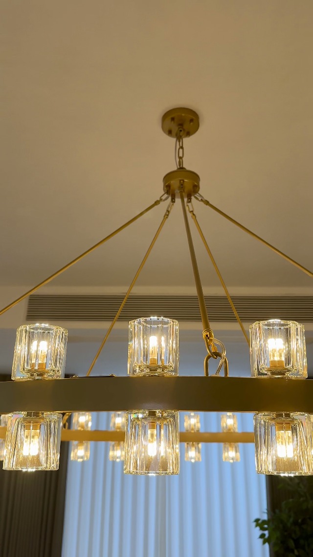 Image of 48 Inch Gold Wagon Wheel Chandelier with Crystal Shade, 48 Lights, Modern Farmhouse Style, Ideal for Dining Room, Kitchen, Entryways