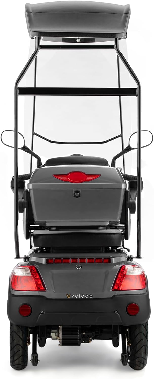 पछाडि view of the VELECO DRACO 3-wheel mobility scooter in grey, displaying taillights and rear storage case.