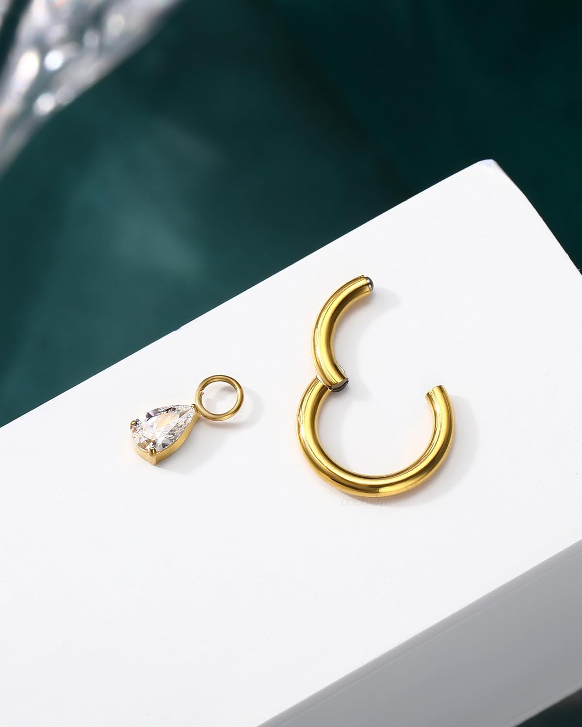 COCHARM Titanium Clicker Hoop Belly Button Ring, 8mm 14G Teardrop Belly Navel Ring, Dangling Hoop Belly Piercing Jewelry Nickel Free