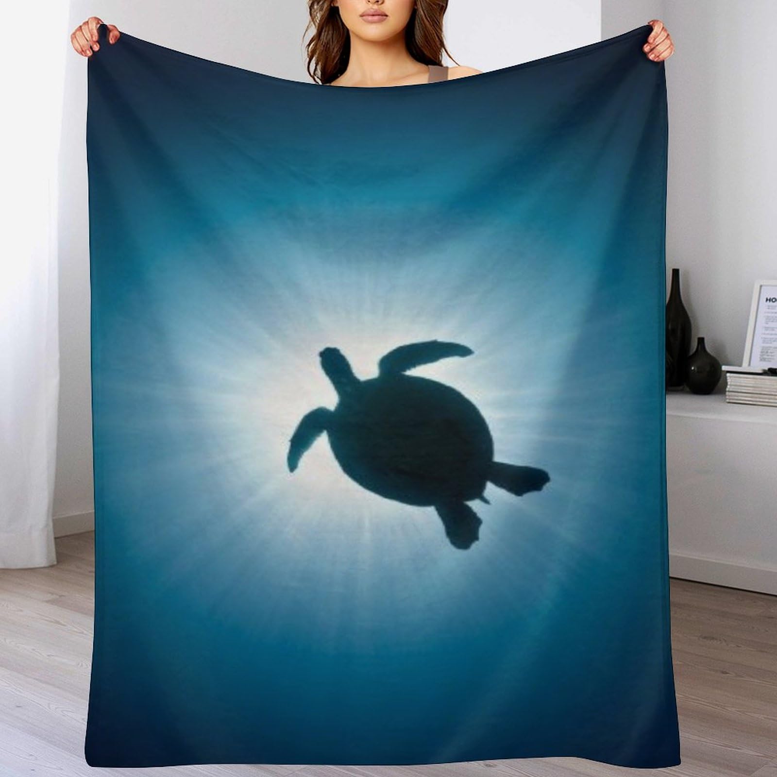 Couverture tortue de mer polaire legere pour ne plus avoir froid sur le canape
