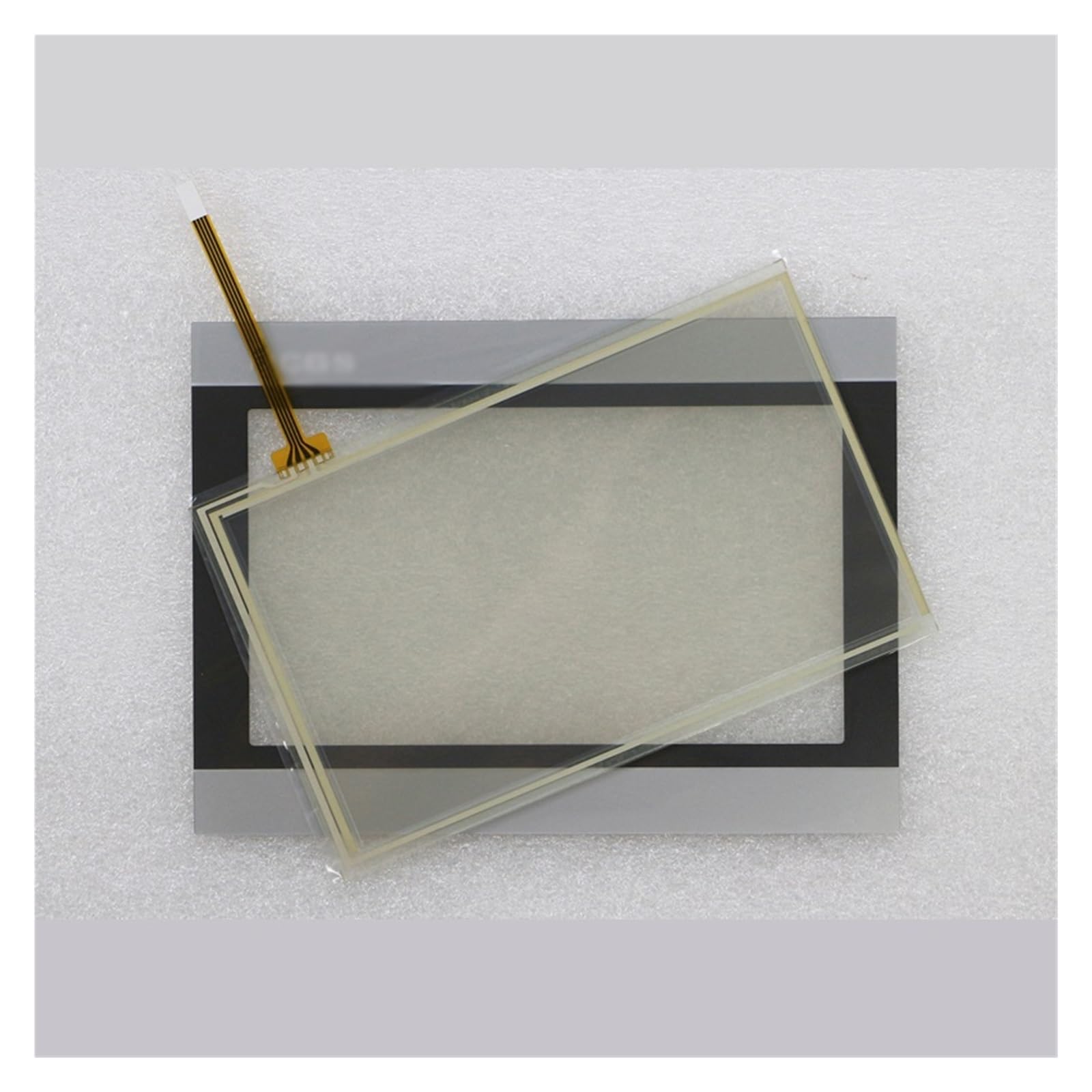 Image of a protective film being applied to a touch screen, showing careful alignment and bubble removal.
