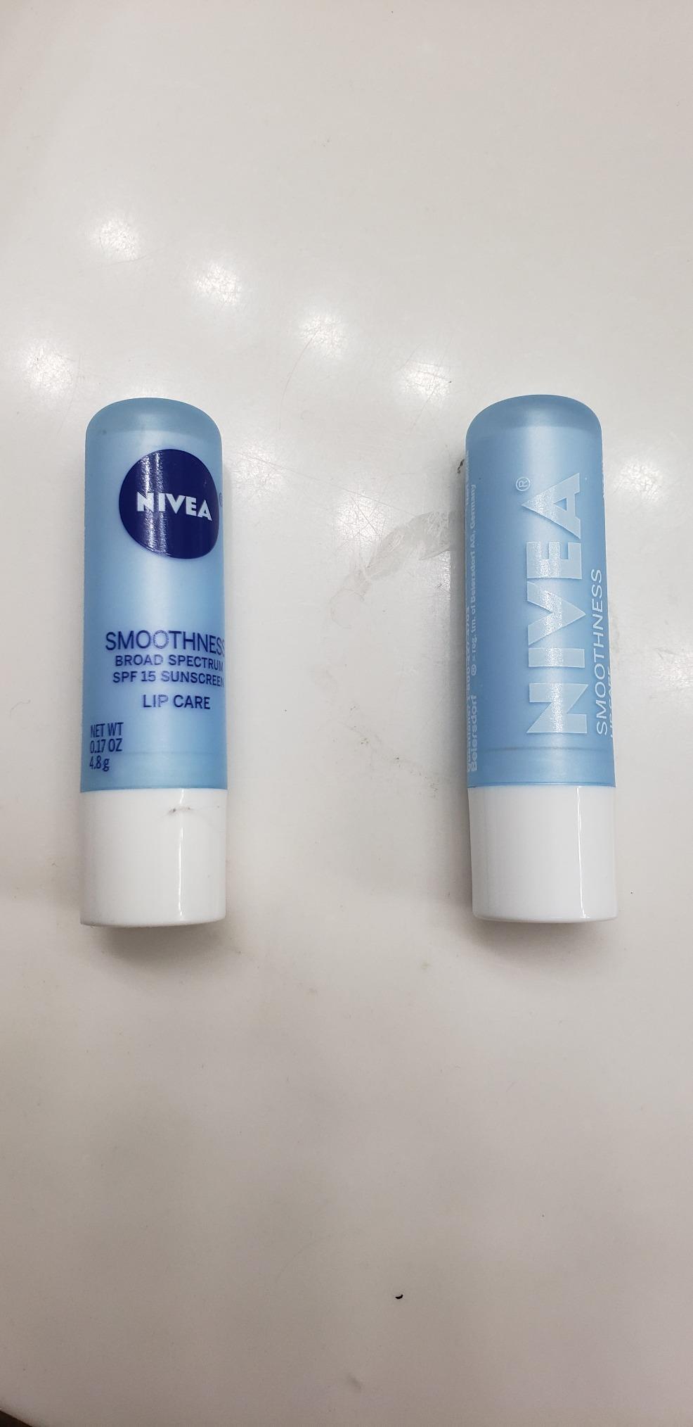 NIVEA Smoothness Lip Care, Sunscreen Lip Balm with SPF 15 Broad Spectrum, Shea Butter, Nourishing Oils and Vitamin C & E, 3-in-1 Moisture, Repair (for Dry Lips) and Sunscreen, 0.17 Oz Stick
