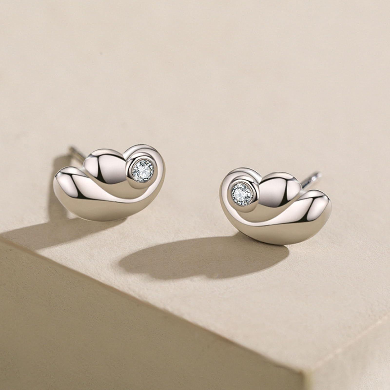 Pendientes de tuerca para mujer, oro blanco y platino, alas de ángel con moissanita