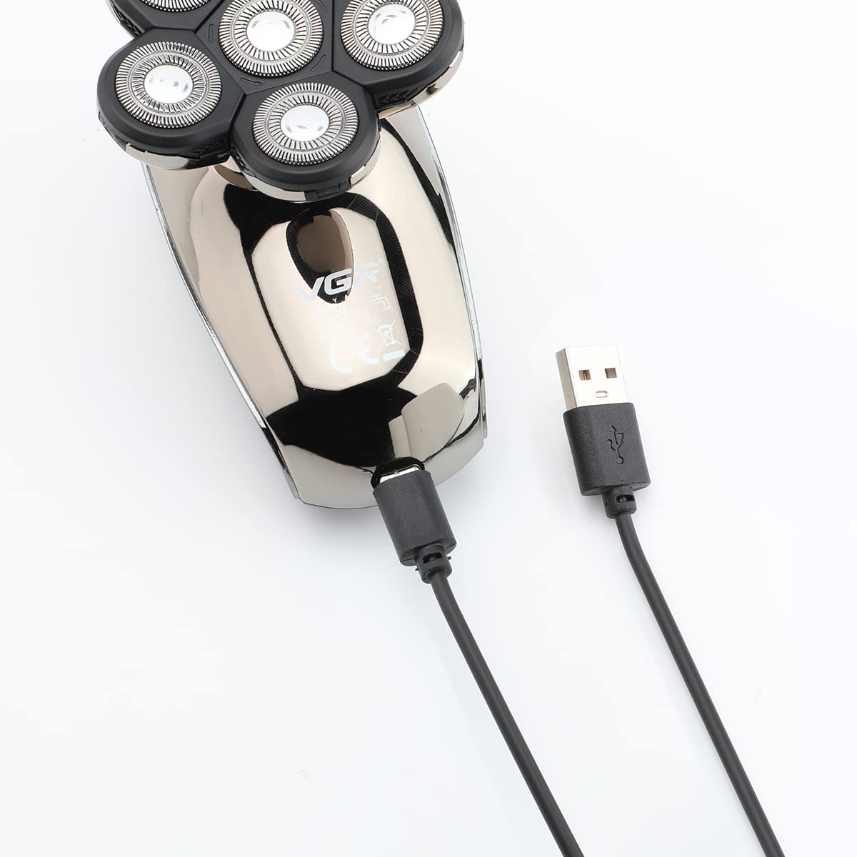 VGR V-320 shaver connected to a USB charging cable.