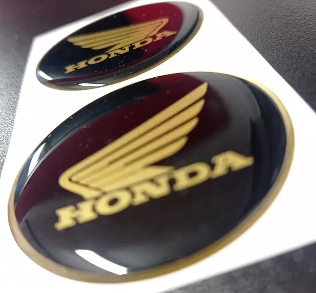Adesivi 3D Resinati per Motocicletta Honda - Nero/Oro 40mm