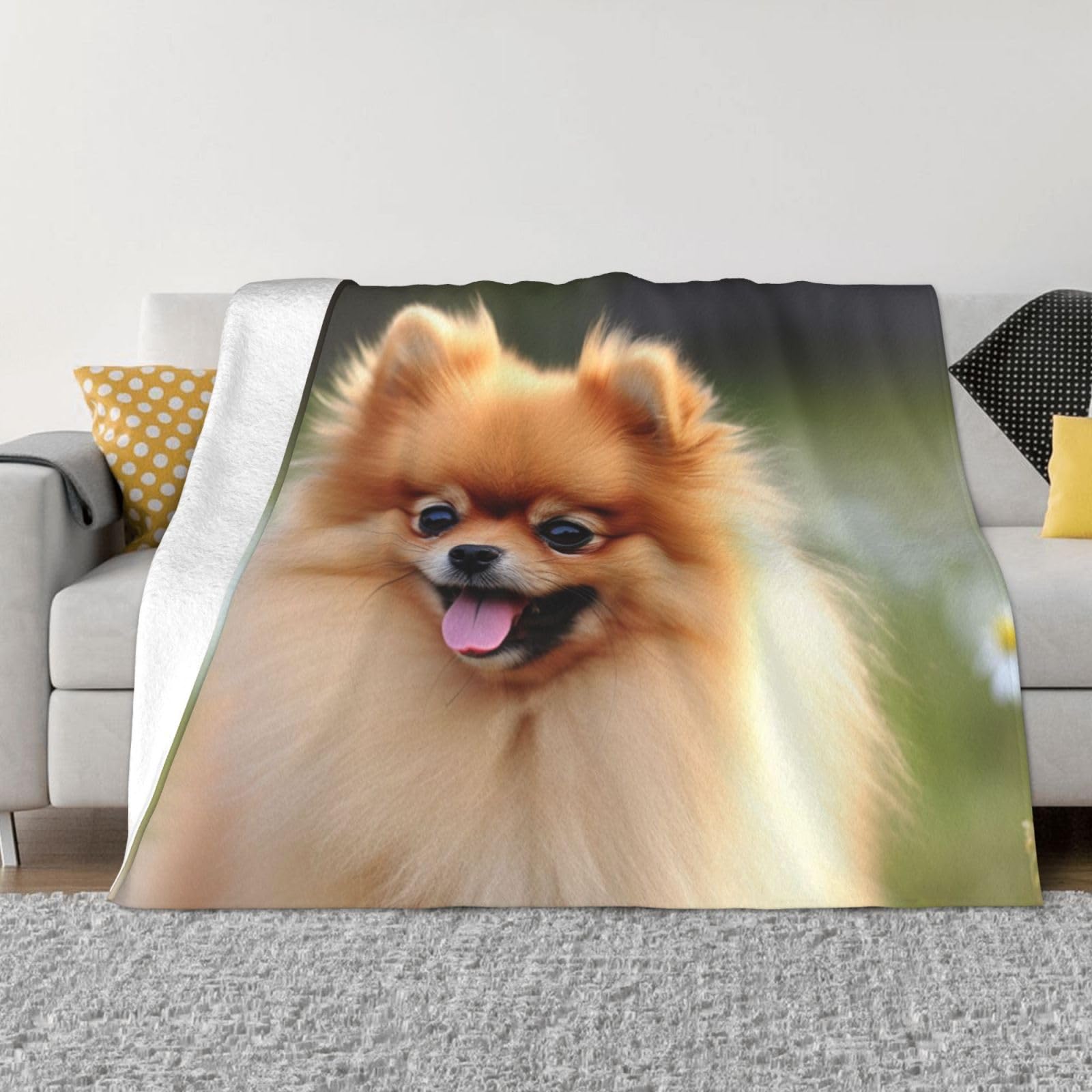 Couverture micro-polaire légère contre le froid sur le canapé et en voyage