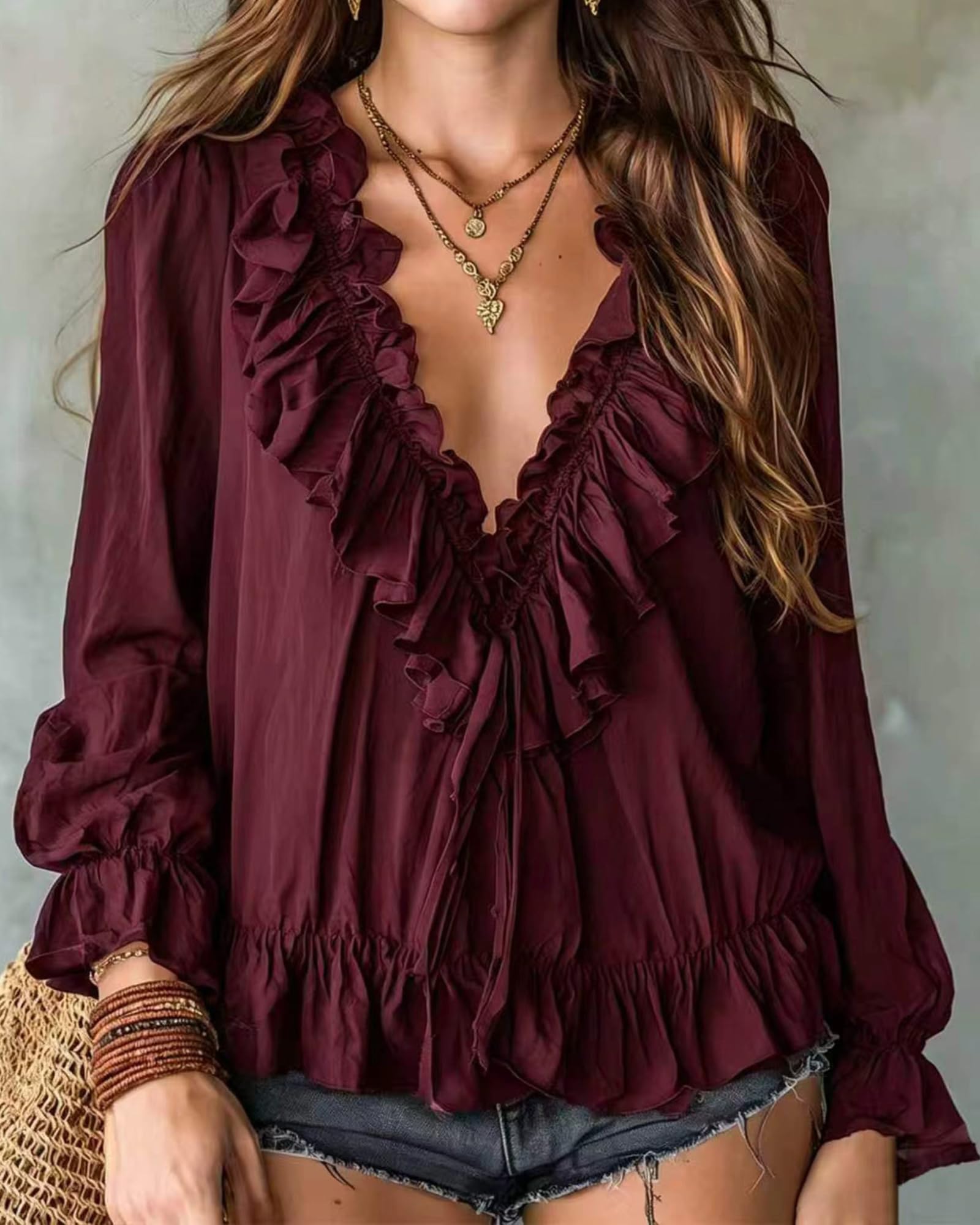 Blusa da donna a maniche lunghe con scollo a V e baschina, top casual | L'orlo a peplo largo offre una vestibilità comoda e non restrittiva