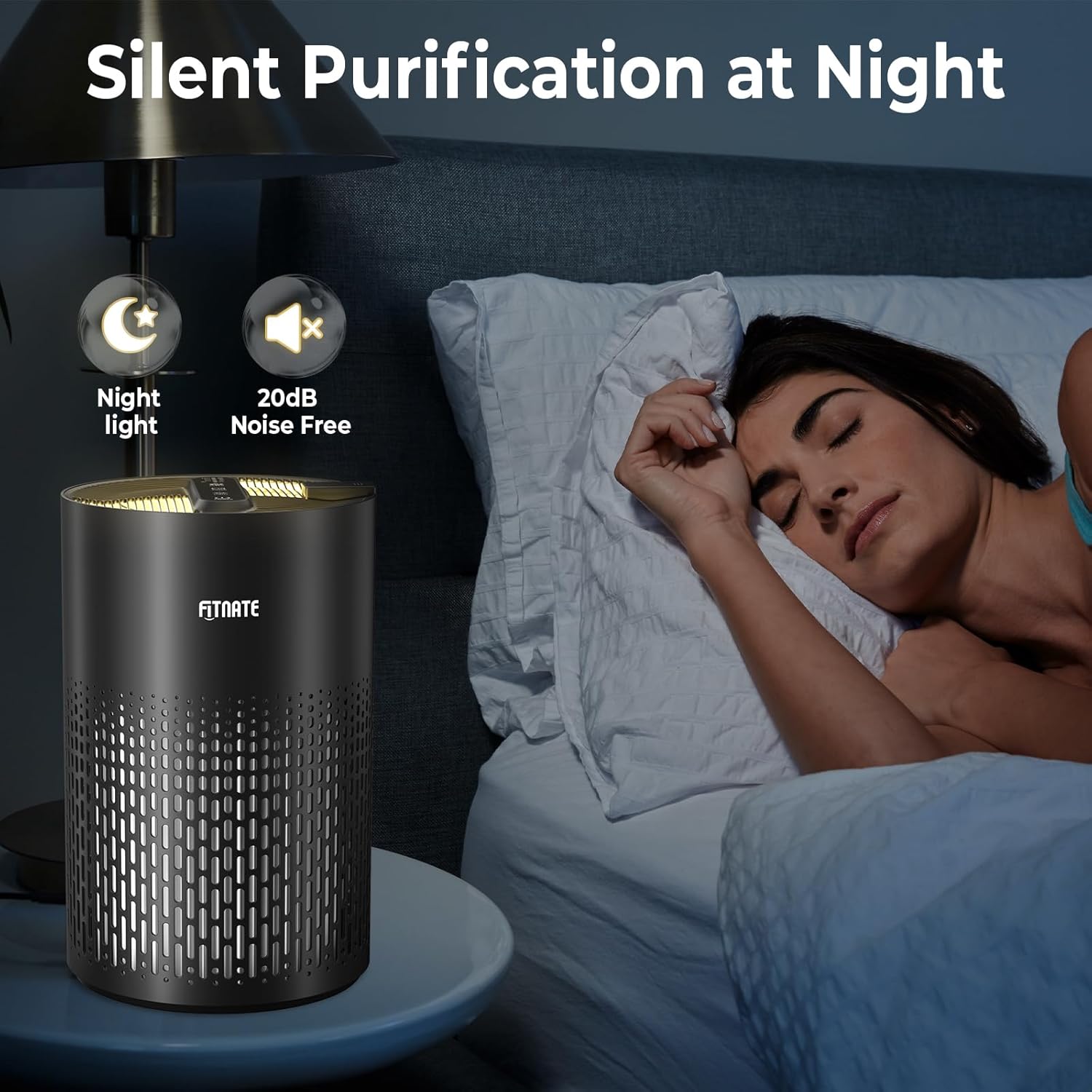 FITNATE Air Purifier operating quietly with its night light on next to a sleeping person.
