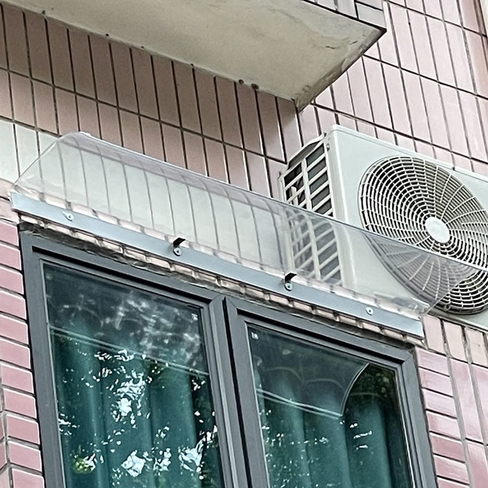 Abri de pluie pour porte évitant les infiltrations d'eau de pluie